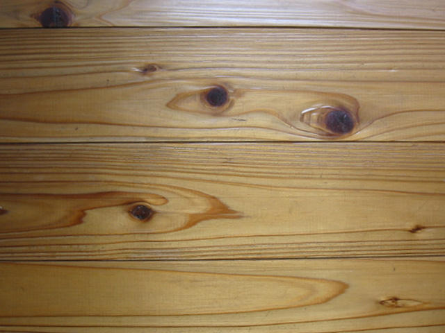 国産杉圧密一枚もの（床暖房兼用）通常品（赤）フローリングの仮並べ時の写真(横向き)